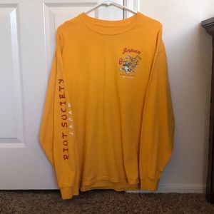 ORANGE LONG SLEEVE GRAPHIC T-SHIRT